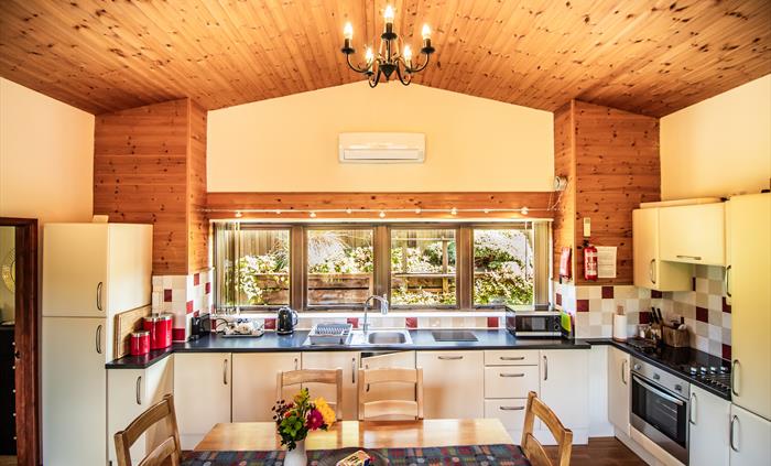 Fully equipped kitchen with built in appliances.